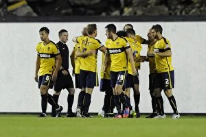 Images Dated 12th August 2014: Celebrating the Goal: Oxford United's Danny Hylton and Team Mates Rejoice after Scoring against