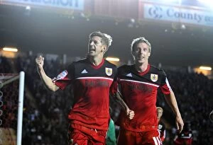 Images Dated 21st August 2012: Celebration at Ashton Gate: Stead and Woolford Rejoice in Bristol City's Championship Victory over