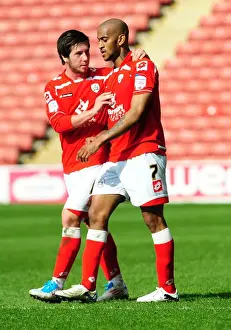 Barnsley V Bristol City Prints: Celebration: Barnsley's Haynes and Butterfield Rejoice in Championship Victory over Bristol City (09/04/2011)