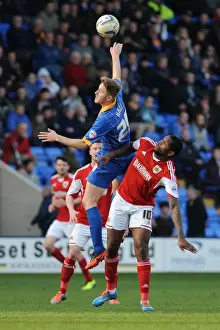 Challenge in the Air: Asa Hall vs. Jay Emmanuel-Thomas in Shrewsbury Town vs. Bristol City Football Match