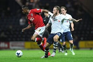 Images Dated 15th September 2015: Championship Clash: Kodjia vs May - Intense Battle at Deepdale