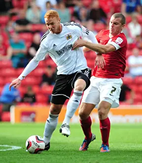 Barnsley V Bristol City Prints: Championship Clash: Ryan Taylor vs Stephen Dawson at Oakwell Stadium
