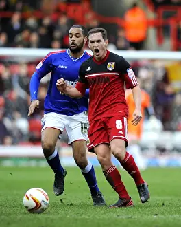 Bristol City V Ipswich Town Prints: Championship Showdown: A Battle for Ball Possession - Neil Kilkenny vs. David McGoldrick