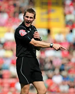 Bristol City V Derby County Prints: Championship Showdown: Bristol City vs Derby County at Ashton Gate Stadium - Referee Craig Pawson