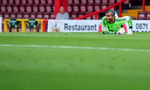 Season 11-12 Prints: Championship Showdown: David James Dramatic Goalkeeping Performance - Bristol City vs