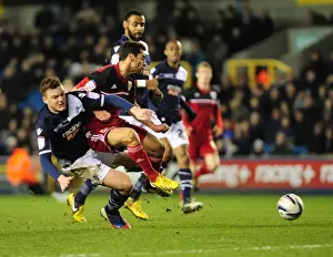 2012 Prints: Championship Showdown: Millwall's Shane Lowry Tackles Sam Baldock of Bristol City