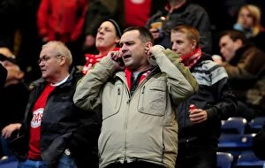 Images Dated 5th February 2011: Championship Showdown: Passionate Bristol City Fans at Deepdale Stadium (05/02/2011)