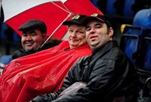 Images Dated 5th February 2011: Championship Showdown: Passionate Bristol City Fans at Deepdale Stadium (05/02/2011)