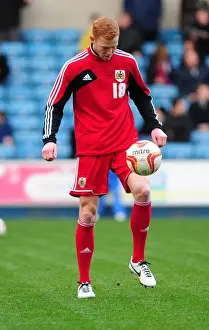 2012 Prints: Championship Showdown: Ryan Taylor's Determined Performance - Millwall vs