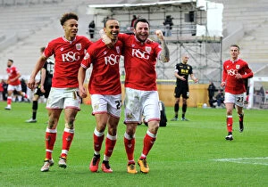 Images Dated 19th March 2016: Championship Triumph: Odemwingie, Reid, and Tomlin's Euphoric Reaction after Goal vs