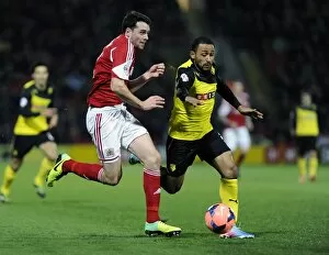 Images Dated 14th January 2014: Chasing the Win: Intense Moment between Ikechi Anya and Brendan Moloney during Watford vs