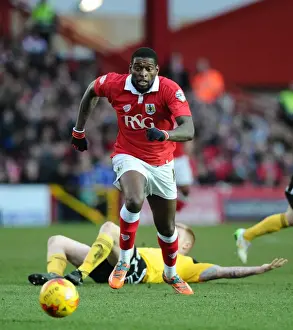 Framed Print : Chasing the Win: Intense Moment as Jay Emmanuel-Thomas of Bristol City Pursues Loose Ball Against Sheffield United