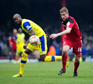 Chasing the Win: Intense Moment as Steven Davies of Bristol City Pursues Loose Ball Against Sheffield Wednesday