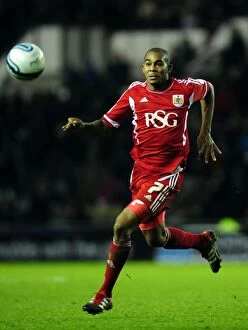 Derby County v Bristol City Collection: Chasing the Win: Marvin Elliott Pursues Loose Ball in Derby County vs
