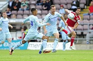 Images Dated 11th August 2013: Chasing the Win: Sam Baldock Pursues Loose Ball in Coventry vs. Bristol City Football Match