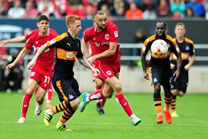 Chasing the Win: Wilbraham Pursues the Ball in Intense Bristol City vs