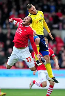 Nottingham Forest V Bristol City Prints: Chris Wood vs. Joel Lynch: Battle for Supremacy in Nottingham Forest vs