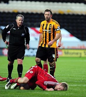 Images Dated 18th December 2010: Christian Ribeiro Foul by Ian Ashbee: Hull City vs. Bristol City Championship Clash (18/12/2010)