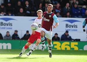 Images Dated 25th September 2010: Christian Ribeiro's Cross: A Moment from the Burnley vs. Bristol City Championship Clash