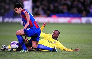 Images Dated 18th October 2011: Cisse vs Jedinak: Tackle Battle in Championship Clash between Crystal Palace