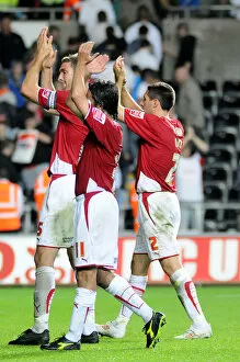 Swansea City v Bristol City Collection: City players salute the travelling fans