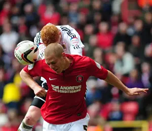Charlton Athletic V Bristol City Prints: Clash in the Air: Morrison vs. Taylor in Npower Championship Showdown