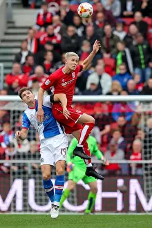Bristol City V Blackburn Rovers Prints: Clash in the Air: Sam Gallagher vs