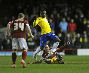 Images Dated 4th February 2014: Clash at Ashton Gate: Moussa vs. Cunningham - Football Rivalry Unfolds