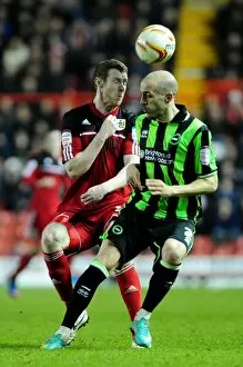 Images Dated 5th March 2013: Clash at Ashton Gate: Pearson vs Saltor in Intense Aerial Battle during Bristol City vs Brighton