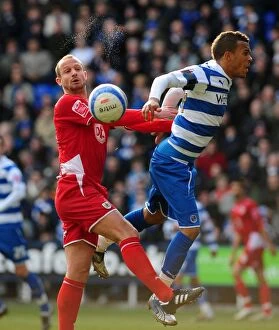 Images Dated 13th March 2010: Clash in the Championship: Carey vs. Bertrand - Aerial Battle at Madejski Stadium, 2010
