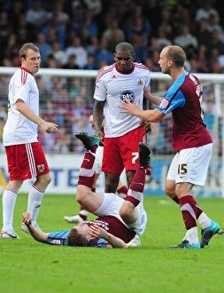 Images Dated 11th September 2010: Clash between Elliott and O'Connor: Scunthorpe vs. Bristol City Championship Match, September 11
