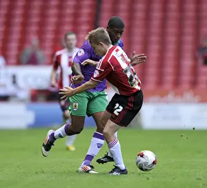 12 15 Prints: Clash of Forces: Mark Little vs. Louis Reed in Sky Bet League One Opener at Bramal Lane