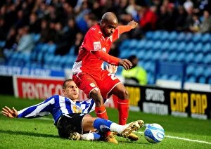 Images Dated 5th April 2010: Clash at Hillsborough: Leon Clarke Stops Jamal Campbell-Ryce's Charge - Sheffield Wednesday vs