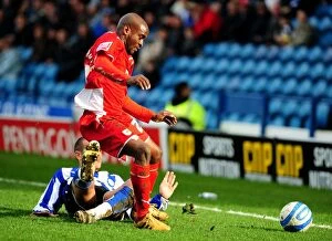 Sheffield Wednesday v Bristol City Collection: Clash at Hillsborough: Leon Clarke Stops Jamal Campbell-Ryce's Charge - Championship Showdown