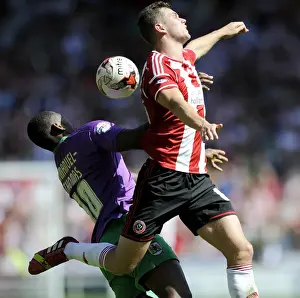 12 15 Prints: Clash of the Newcomers: McGahey vs. Emmanuel-Thomas - Kicking Off League One Season