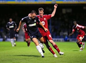 Images Dated 10th August 2010: Clash at Roots Hall: David Clarkson vs. Graham Coughlan in the Carling Cup Battle between Southend