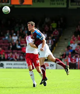 Scunthorpe Utd V Bristol City Prints: Clash in the Sky: Byrne vs. Skuse at Glanford Park - Scunthorpe United vs