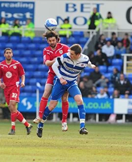 Images Dated 13th March 2010: Clash in the Sky: Hartley vs. Sigurdsson in the Championship Battle, Reading vs