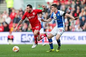 Images Dated 22nd October 2016: Clash of the Titans: Lee Tomlin vs. Darragh Lenihan - Intense Moment at Ashton Gate