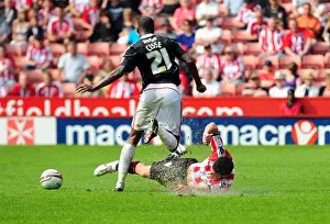 Clash of Titans: Lowry vs. Cisse - Sheffield United vs. Bristol City Championship Showdown, 23rd April 2011: A Football Rivalry Unfolds at Bramall Lane