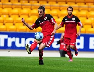 Images Dated 28th July 2012: Cole Skuse in Action: A Midfielder's Determination at McDiarmid Park (2012)