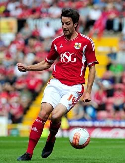 Images Dated 6th August 2011: Cole Skuse of Bristol City in Action against Ipswich Town at Ashton Gate Stadium