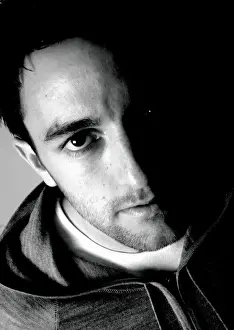 Cole Skuse: A Focused and Determined Figure in Bristol City Football Club Colors