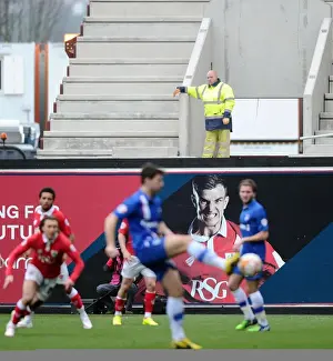 Construction Worker Taking a Break to Watch Bristol City vs. Gillingham at Ashton Gate, 2015