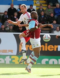 Images Dated 25th September 2010: Controversial Moment: Bikey's Unnoticed Handball in Burnley vs