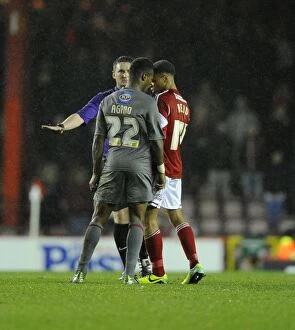 Images Dated 14th December 2013: Controversial Moment: Kieran Agard Escapes Punishment for Heading into Bobby Reid's Challenge in