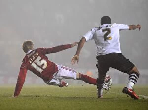 Images Dated 1st February 2011: Controversial Penalty Call: Andy Keogh Felled in Bristol City vs Swansea City (01/02/2011)