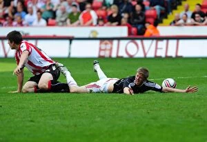 Images Dated 23rd April 2011: Controversial Penalty: Jon Stead Wins Against Harry Maguire for Bristol City vs