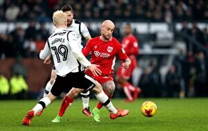 Images Dated 11th February 2017: David Cotterill Drives Past Will Hughes: Derby County vs. Bristol City Championship Clash
