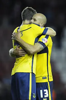 Capital One Prints: David Hunt and Jonathan Meades Celebrate Oxford United's Late Win over Bristol City